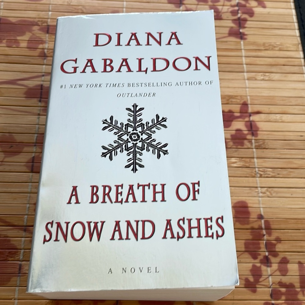 Diana Gabaldon  A breath of snow and ashes.  Book from outlander series.